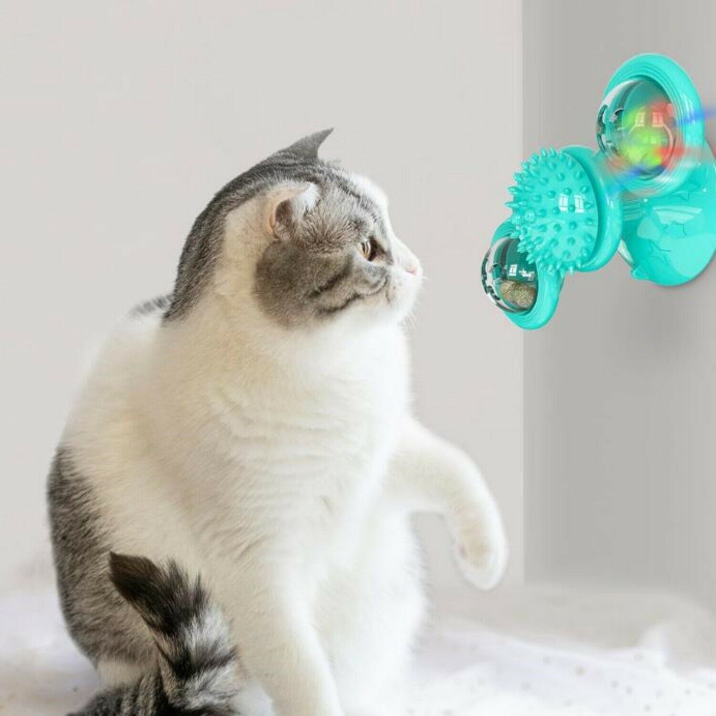 FelineFun™ Rotating Spinner Cat Toy – Teeth & Massage Ball